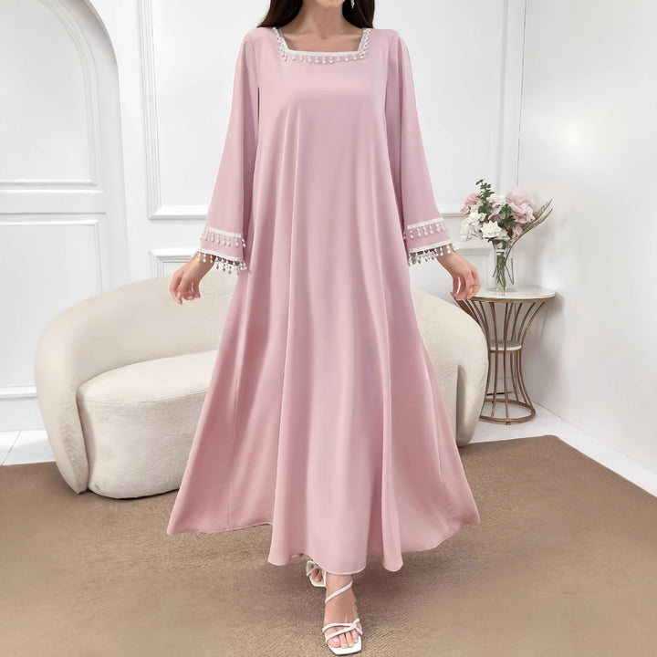 Kvinders elegante maxi kjole med dekorative frynser og brede ærmer Skovae