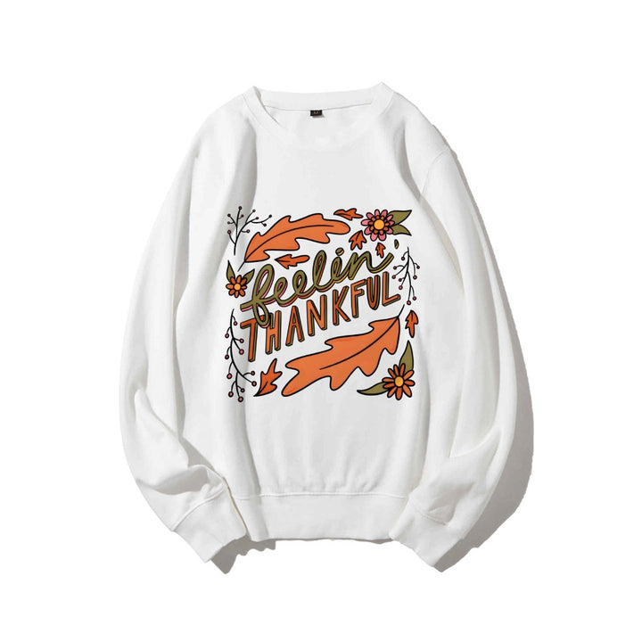 Kvinders sweatshirt med farverigt efterårsdesign og inspirerende tekst Stilla