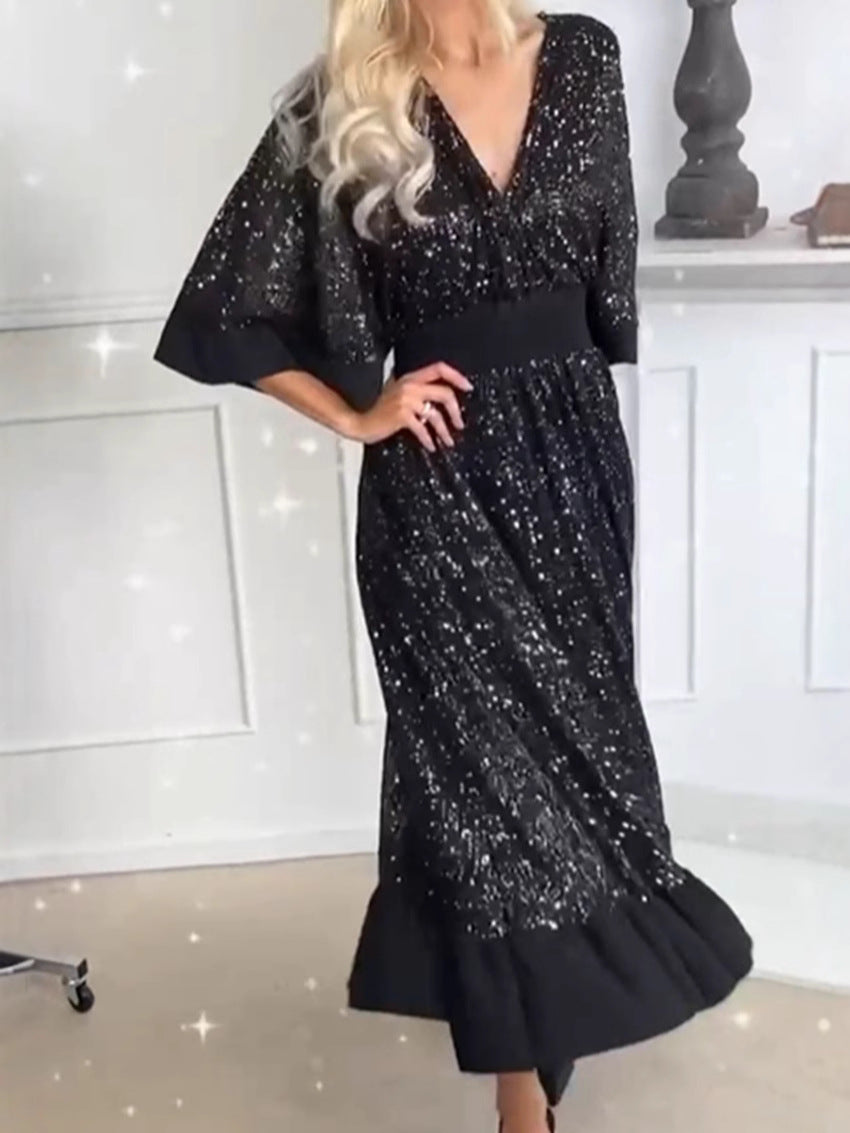 Dame glitrende maxikjole i elegant A-linje snit med voluminøse ærmer Stilla