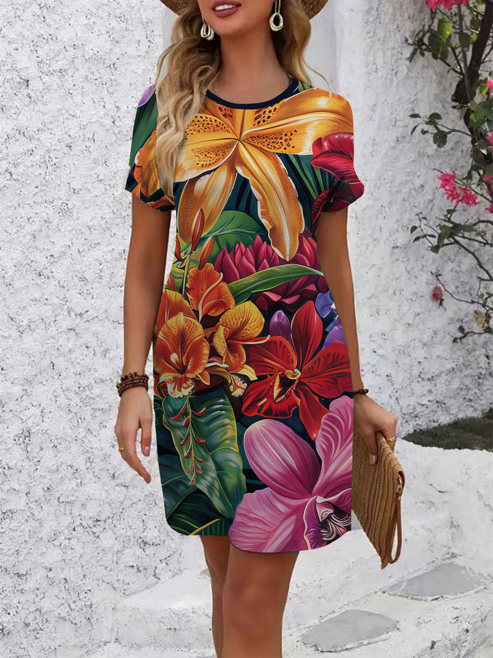 Dame komfortabel fritidskjole med livligt blomsterprint og løs pasform Skovae