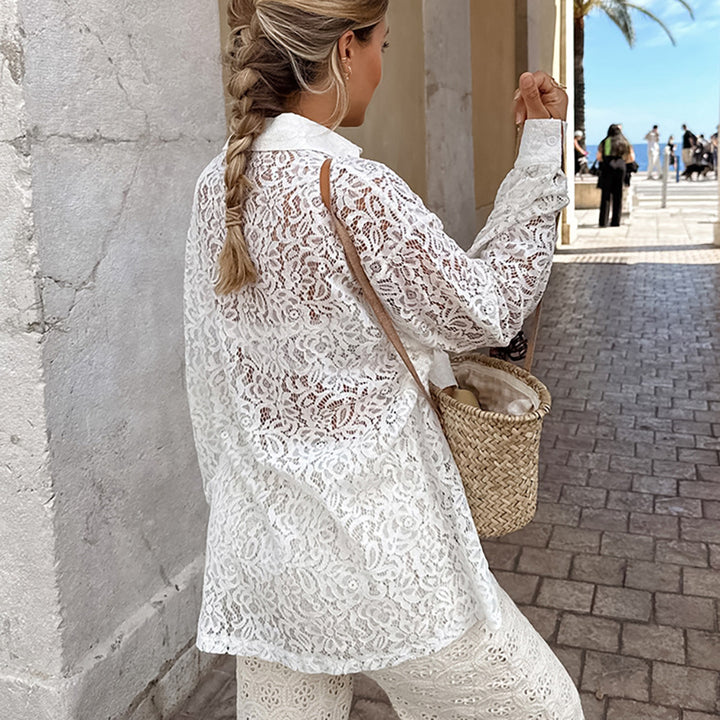 Dame spidsbluse i casual oversized-snit med praktiske lommer Stilla