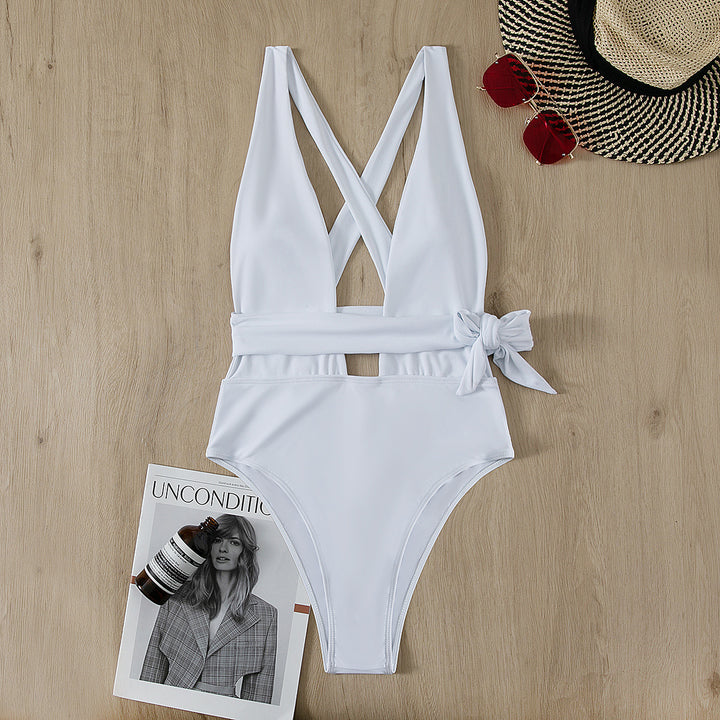 Dame sporty one-piece swimsuit with cross-back and tie belt Skovae