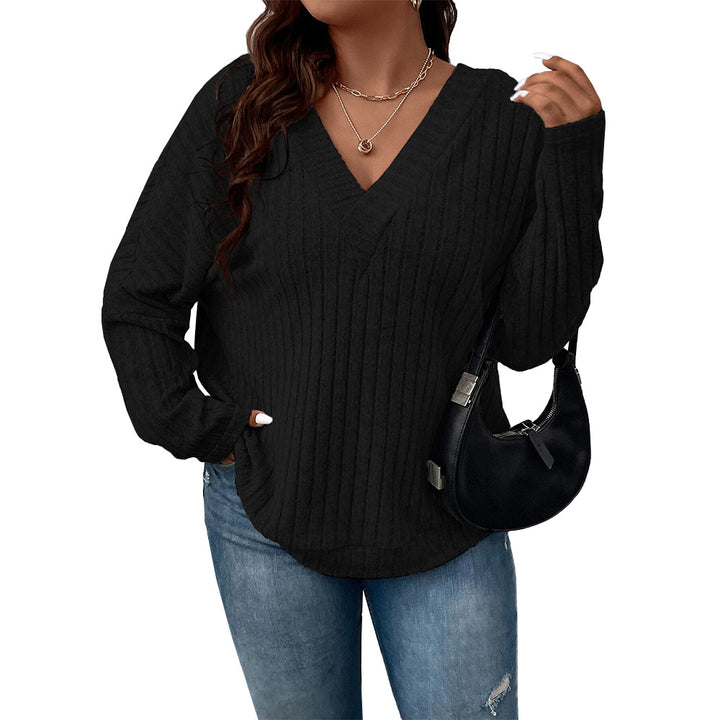 Dame løs sweater med V-hals og ribstruktur Stilla