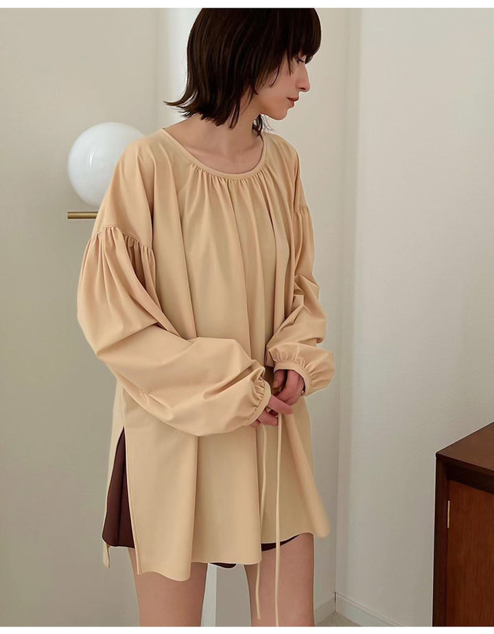 Damebluse med voluminøse ærmer og elegant snit Stilla