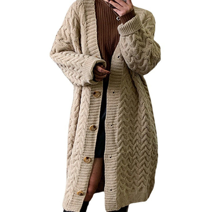 Kvindernes strik cardigan med voluminøst kabeldesign og praktiske knaplukninger Stilla
