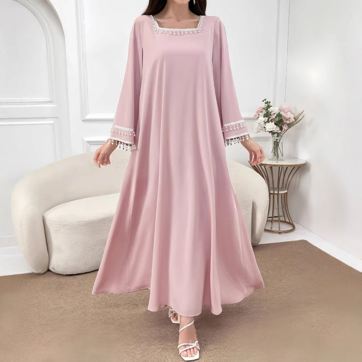 Kvinders elegante maxi kjole med dekorative frynser og brede ærmer Skovae