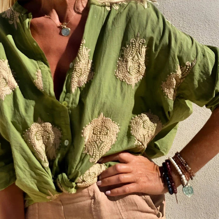 Damebluse med blomsterbroderi og ballonærmer Stilla