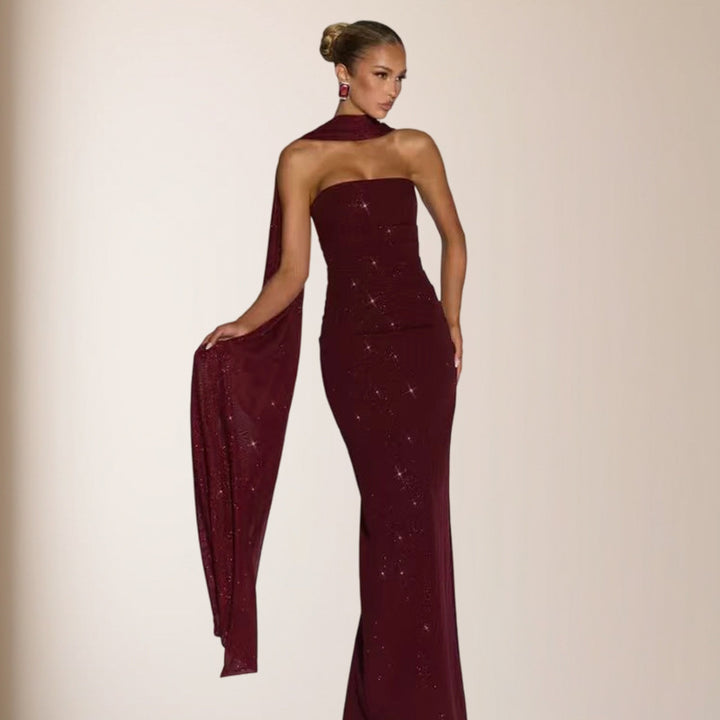 Dame elegante aftenkjole med glitrende paljetter og design uden stropper
