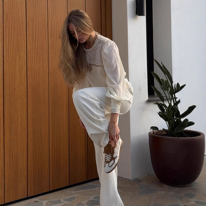 Dame bluse med elegante spidseapplikationer og voluminøse ærmer Stilla
