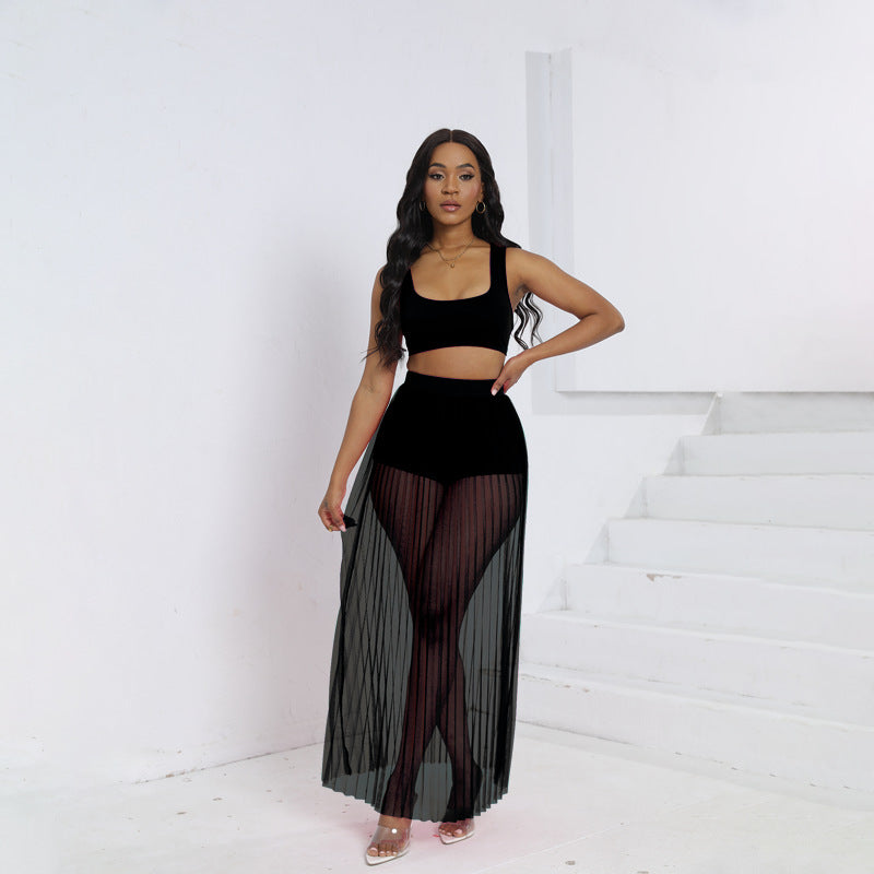 Dame loungewear-sæt med gennemsigtig maxi-nederdel og matchende top Stilla