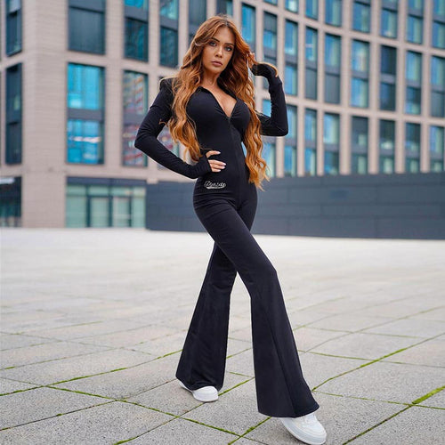Dame jumpsuit i sporty look med hætte og vidde ben Stilla