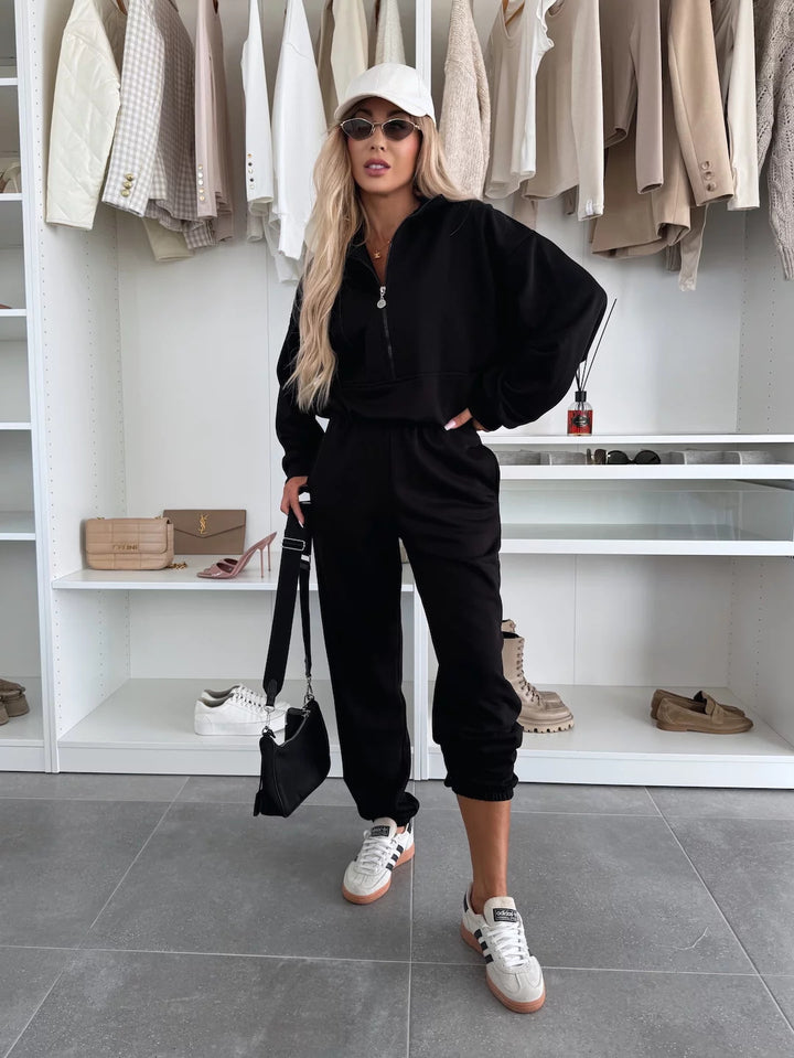 Kvinders trendy sweat suit med halvlange lynlås og elastisk talje Skovae