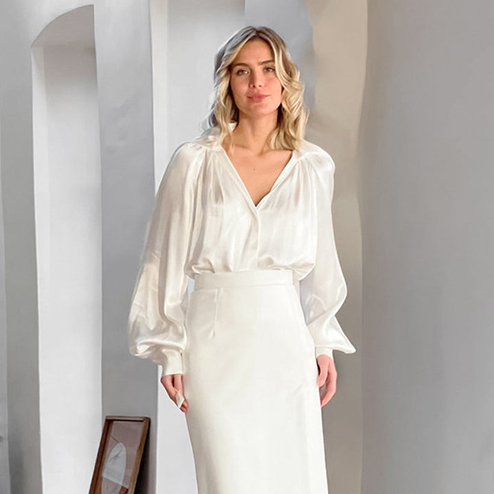 Dame elegant bluse med voluminøse ærmer og dyb v-hals Stilla