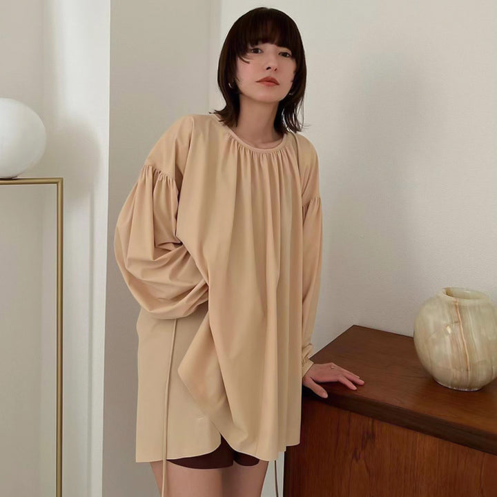 Damebluse med voluminøse ærmer og elegant snit Stilla