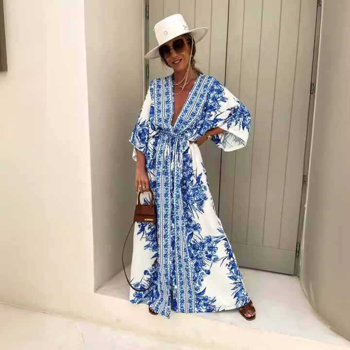 Dame let kaftan med kunstnerisk blomsterdesign og elegante detaljer Stilla