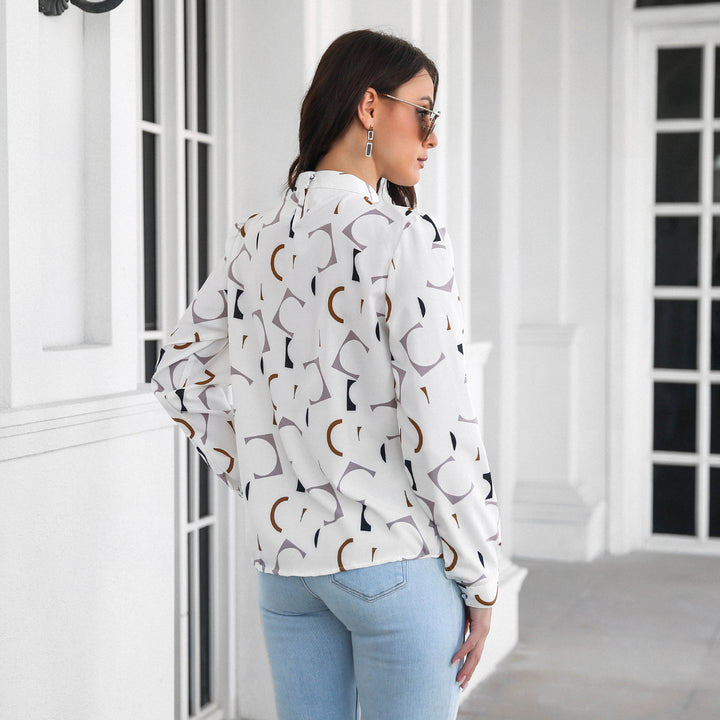 Damebluse med moderne geometrisk design og afslappet snit Stilla