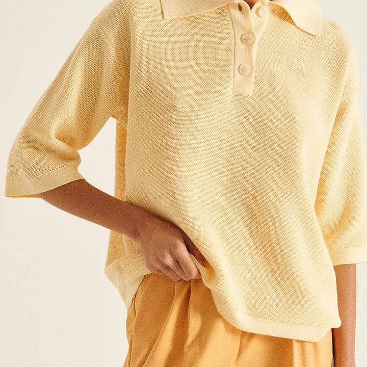 Dame polo shirt med luftig striktekstur og knapbar krave Stilla