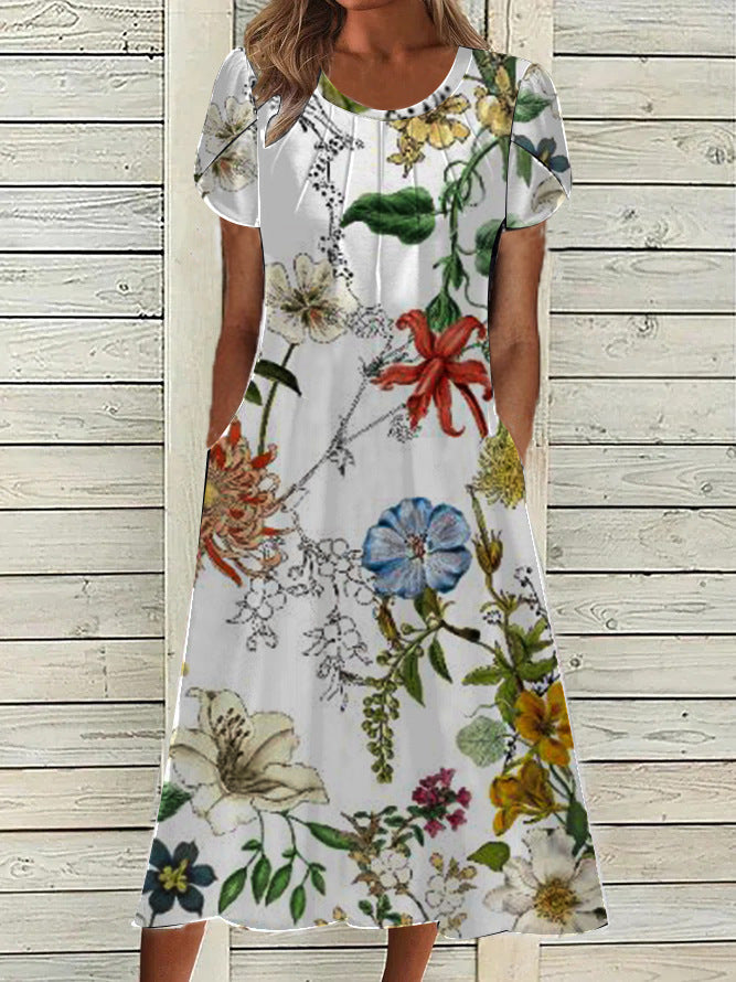 Dame maxikjole med botanisk blomsterprint og praktiske lommer Stilla