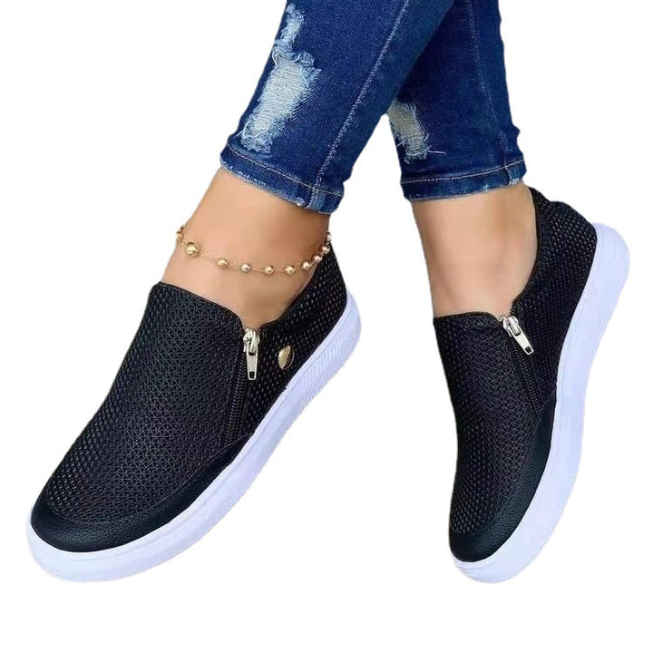 Dame Slip-On Sneakers med fashionable lynlåsdesign og åndbart overflade Stilla