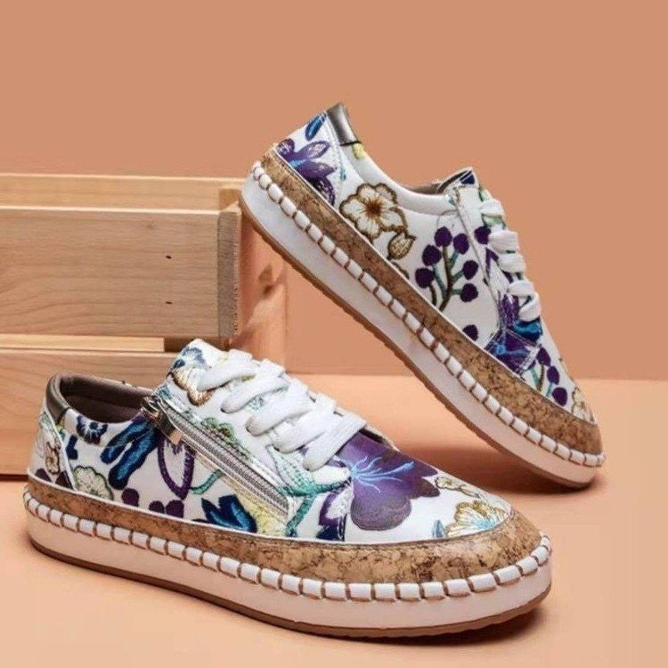 Dame modische sneakers med floral design og praktisk lynlås Stilla
