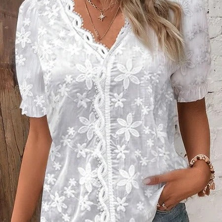 Damebluse med romantisk blomsterdesign Stilla