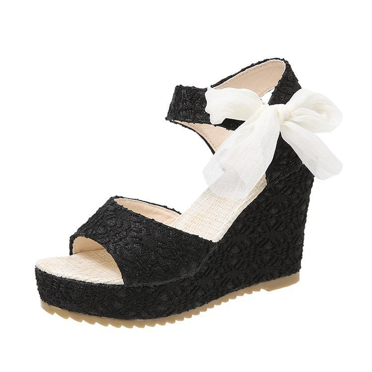 Dame nan romantisk kilehælsandalette med spidse detaljer og organza-sløjfe Skovae