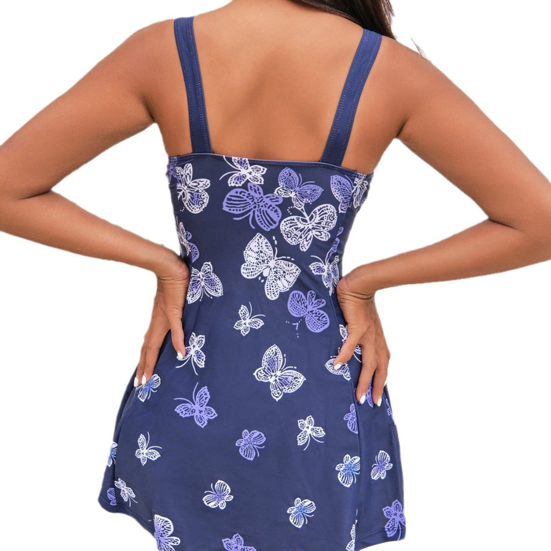 Dame badeshorts med farverigt sommerfugledesign og elegant nederdel Stilla