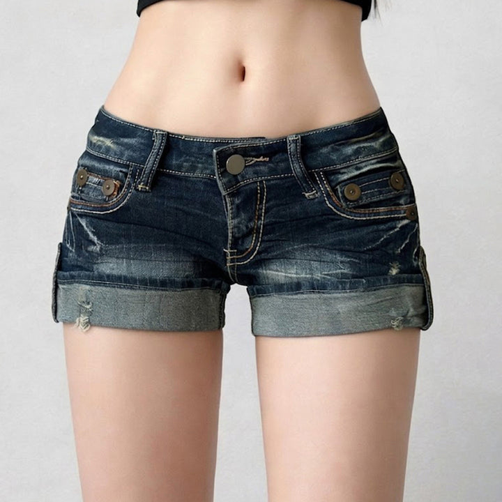 Dame casual denim shorts med fashionable distressed detaljer og ombukket kant Skovae