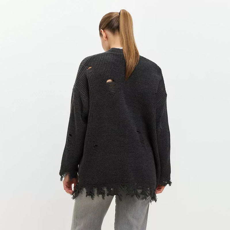 Dame oversized strikpullover med frynset detaljer og afslappet struktur Stilla