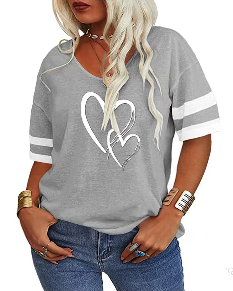 Damer afslappet T-shirt med kreativt hjerte design og sporty ærmer Stilla