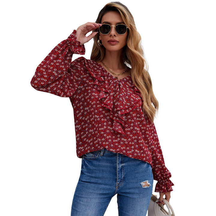 Damebluse med flæsedetaljer og blomster mønster Stilla