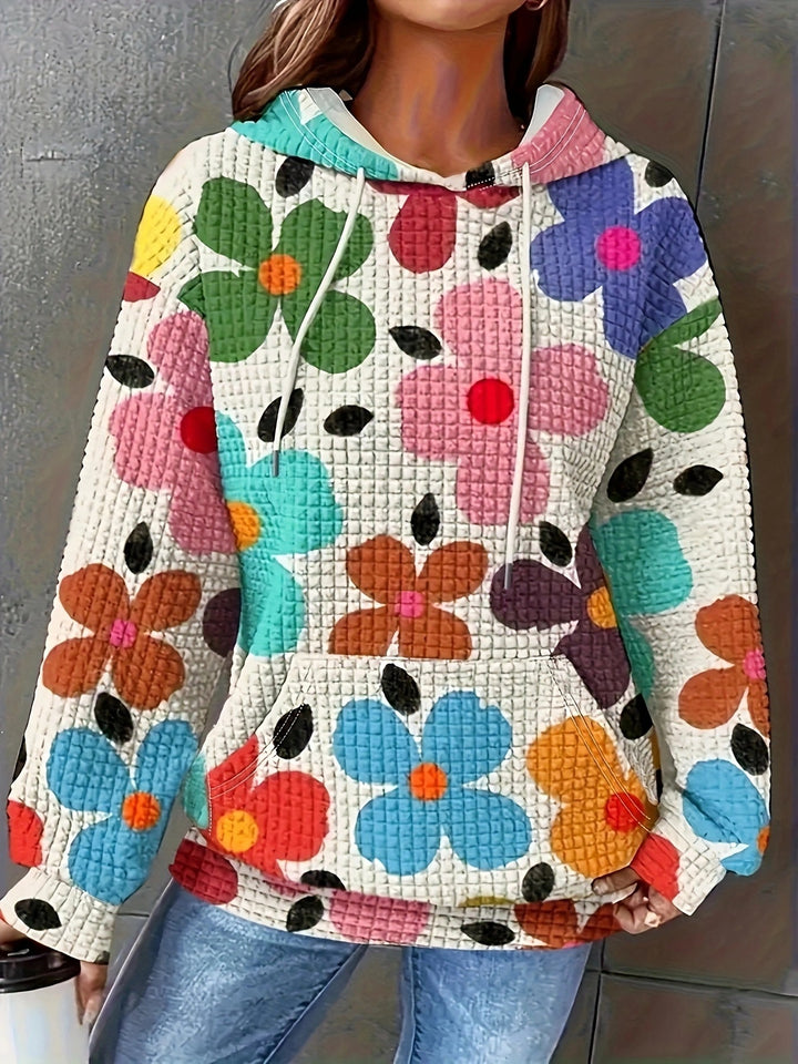 Dame hættebluse med blomsterdesign og struktureret stof Stilla