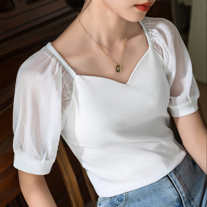 Dame elegant T-shirt med puffærmer og V-udskæring Stilla