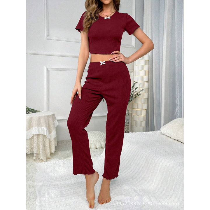 Dame fritids-jumpsuit med moderne ribdesign og legende sløjfedetalje Stilla