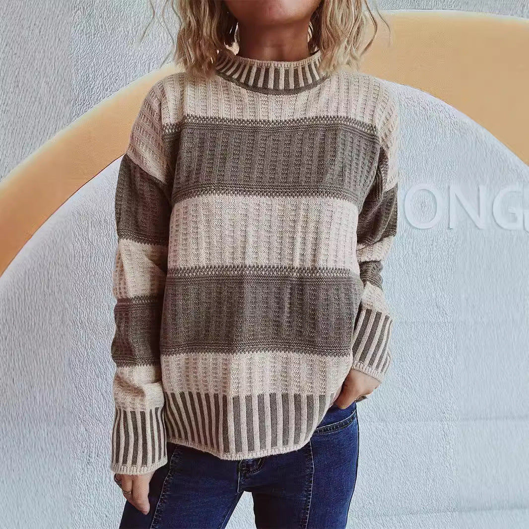 Kvindernes stilfulde strikkede sweater med unikt stribemønster og høje manchetter Stilla