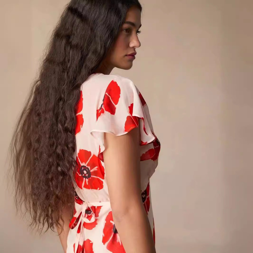 Dame maxikjole med floral design og elegant V-udskæring Stilla
