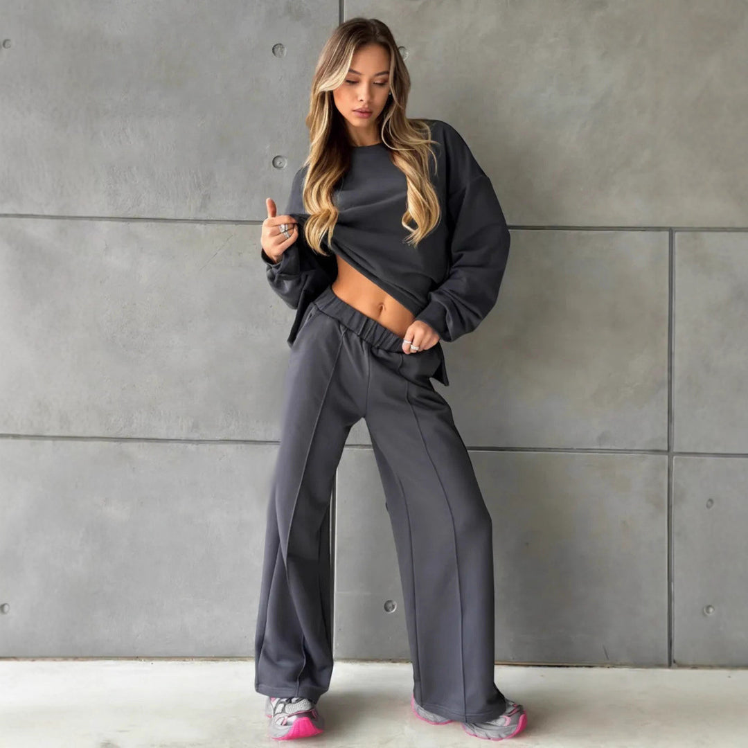 Damer elegant sweatsuit med løs pasform og stilfuld mærkedetalje Skovae