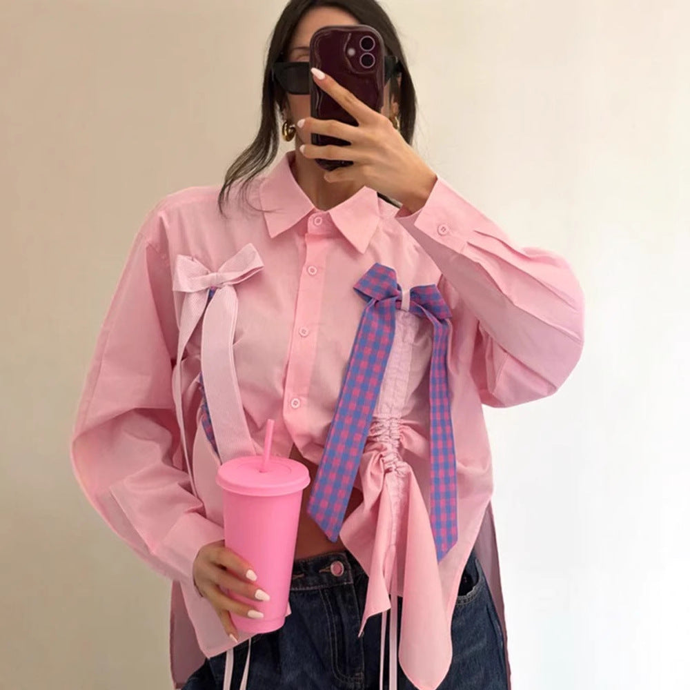 Damebluse med dekorative sløjfer og rynket detalje Stilla