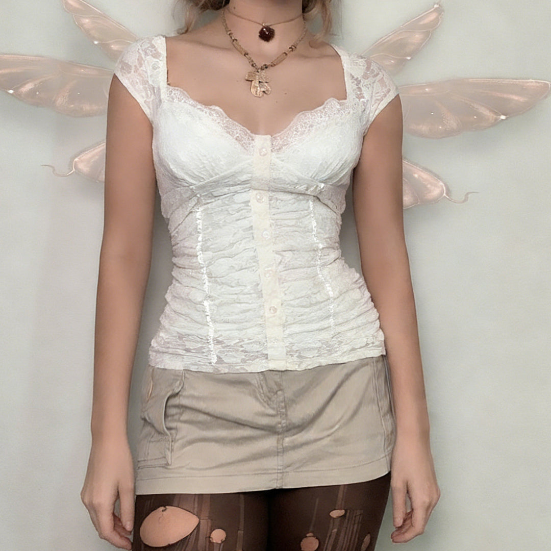 Dame Blonde-Cropped-Top med elegant V-udskæring og flæse detaljer Skovae