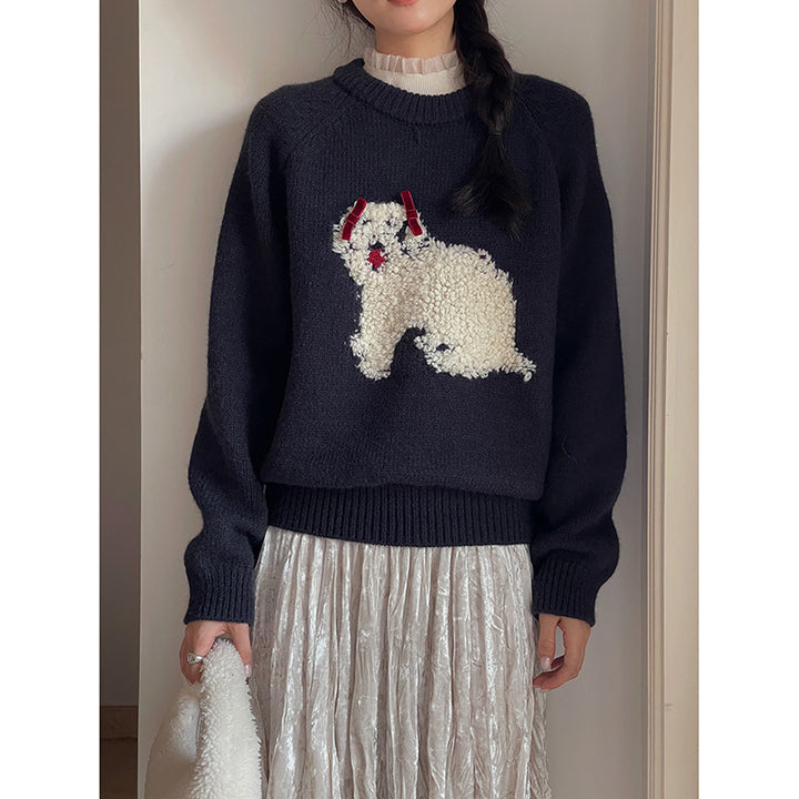 Dame strikket pullover med legesygt hundemotiv og elegante ruffleafslutninger Stilla