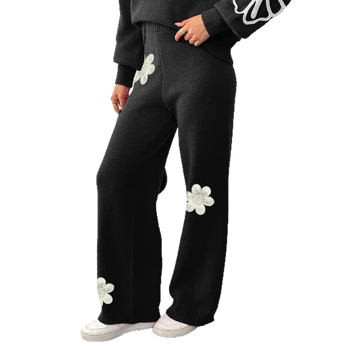 Dame strikbukser med blomstret design og bredt ben Stilla