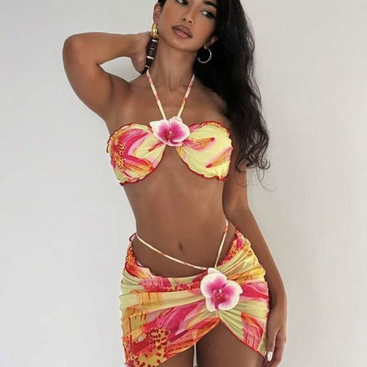 Dame bikini-sæt med floralt design og legesyg omslagsskjørt Skovae