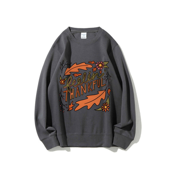 Kvinders sweatshirt med farverigt efterårsdesign og inspirerende tekst Stilla