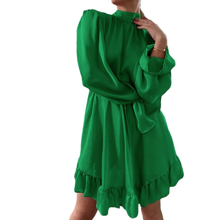 Dame wrapped dress with elegant ruffle details and high stand-up collar Stilla
