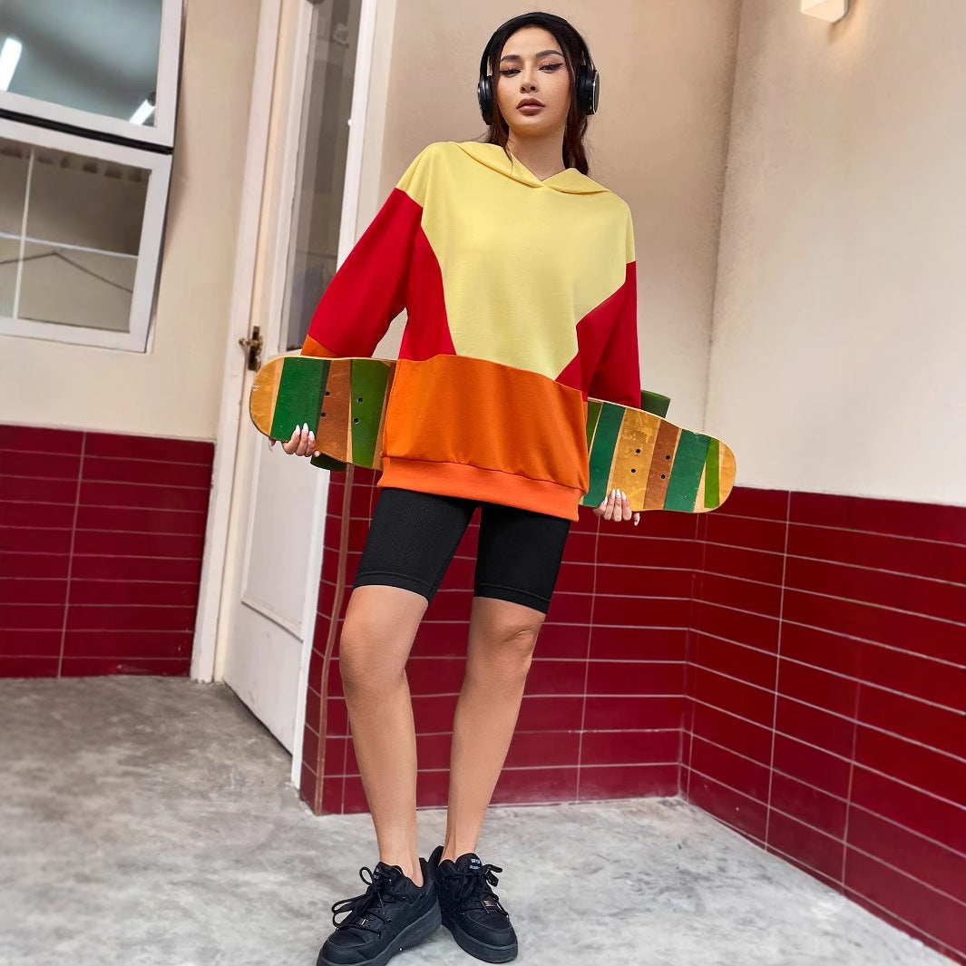 Kvinders afslappede hoodie med farverig farvebloksdesign Stilla