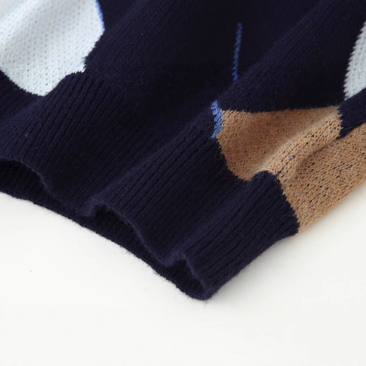 Dame modet sweater med elegant diamantmønster Stilla