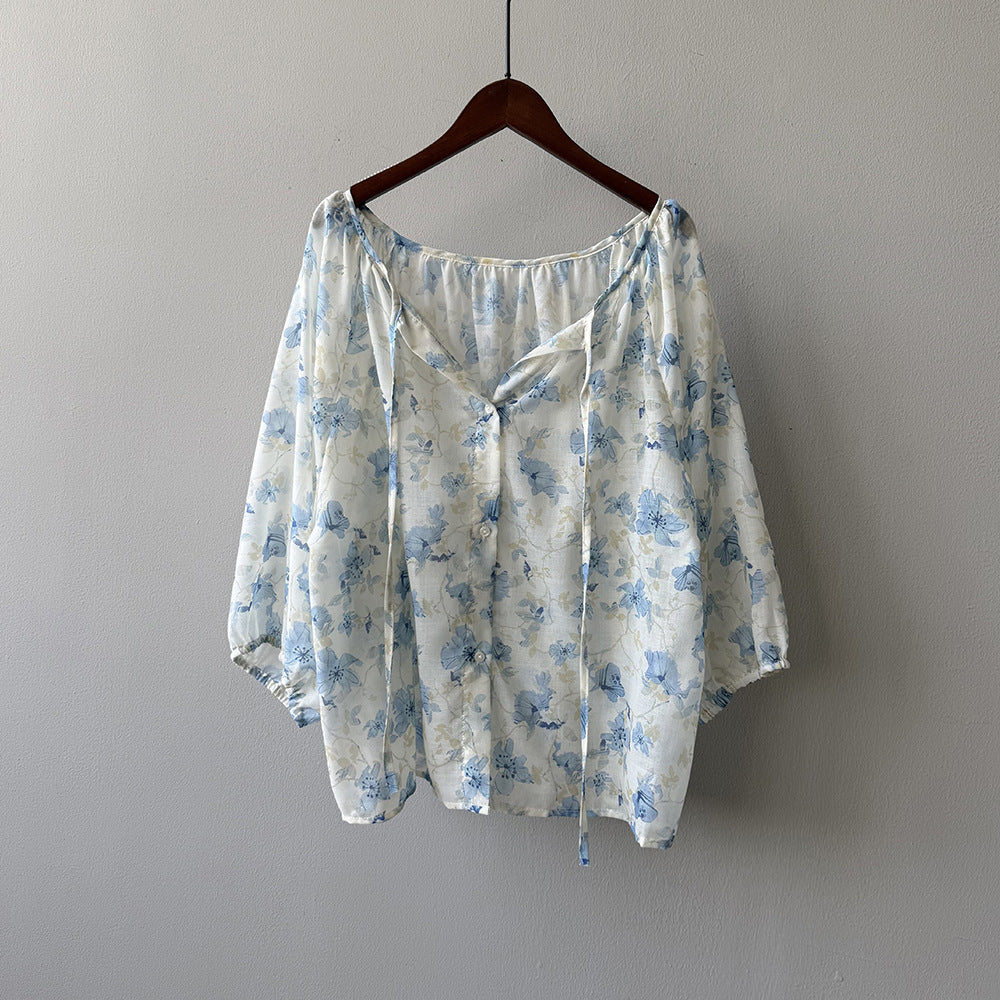 Damebluse med blomstertryk og justerbart bindingbånd Stilla