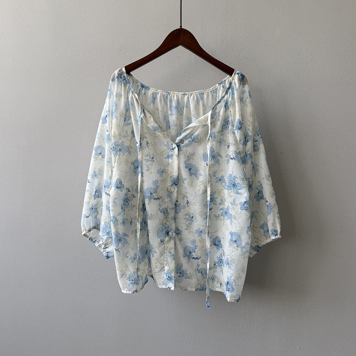 Damebluse med blomstertryk og justerbart bindingbånd Stilla
