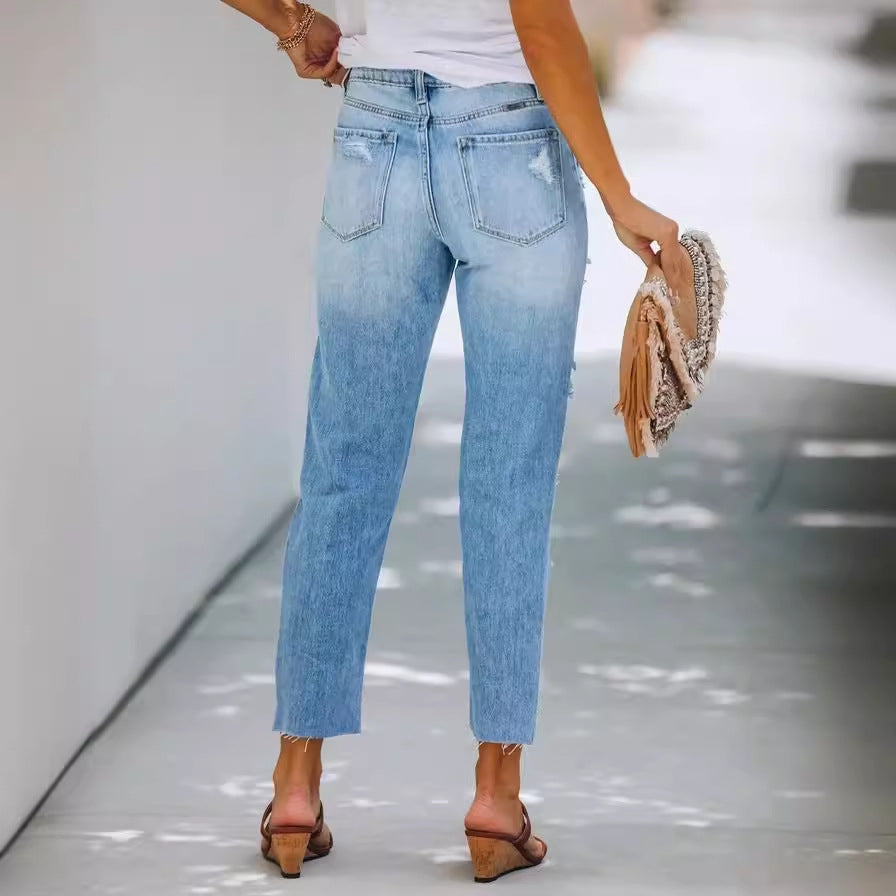 Damer slitte jeans i løs pasform med modetrends detaljer