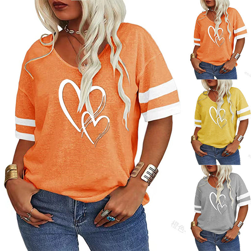 Damer afslappet T-shirt med kreativt hjerte design og sporty ærmer Stilla